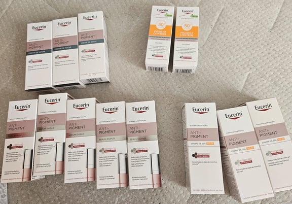 Multiple boxes of Eucerin Anti-Pigment and Pigment Control skincare products arranged on a surface. review